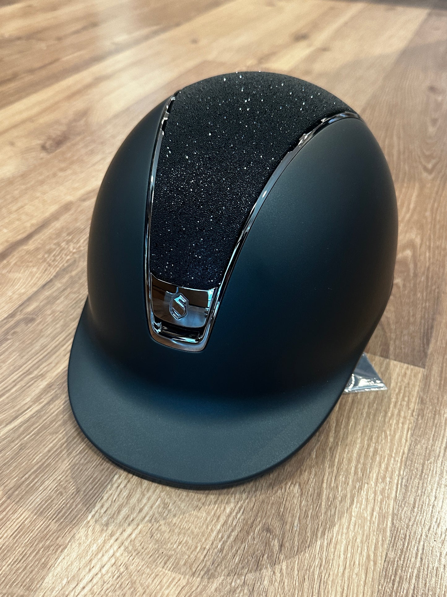 Black helmet with crystal fabric top