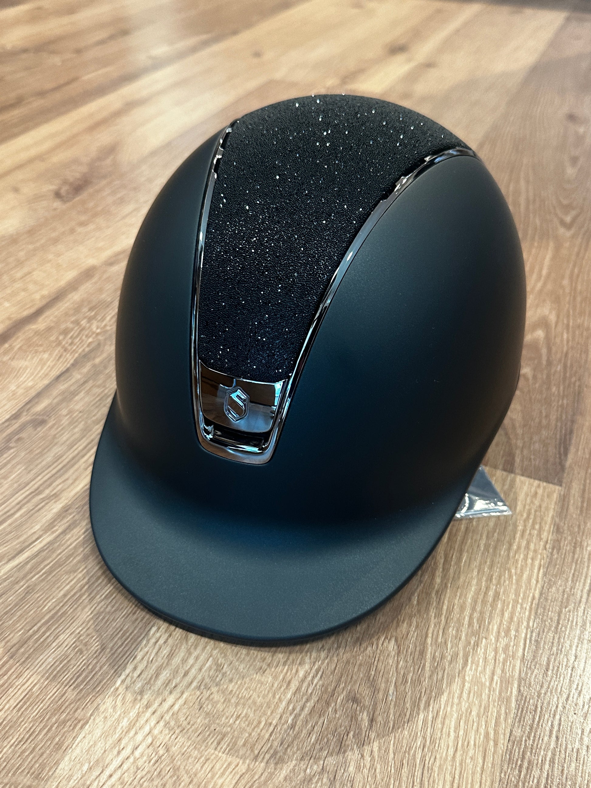 Black helmet with crystal fabric top