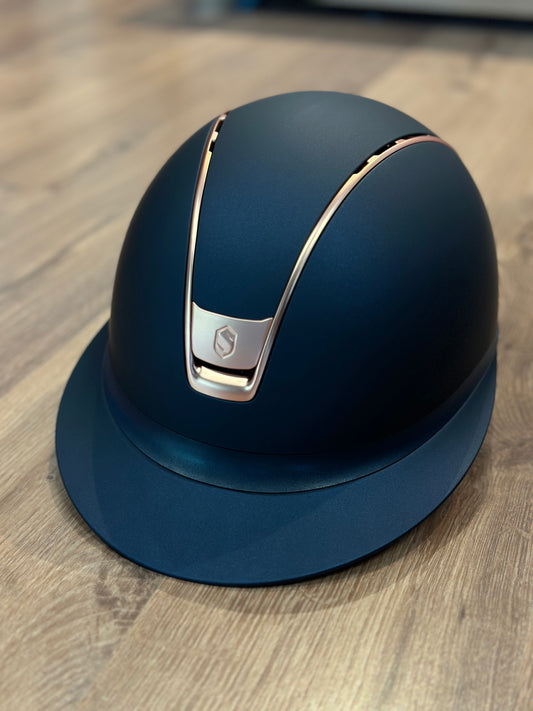 Navy wide brimmed helmet with rose gold trip and blazon