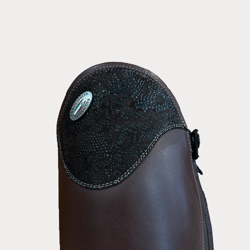 Brown tall boot with fancy top and heel
