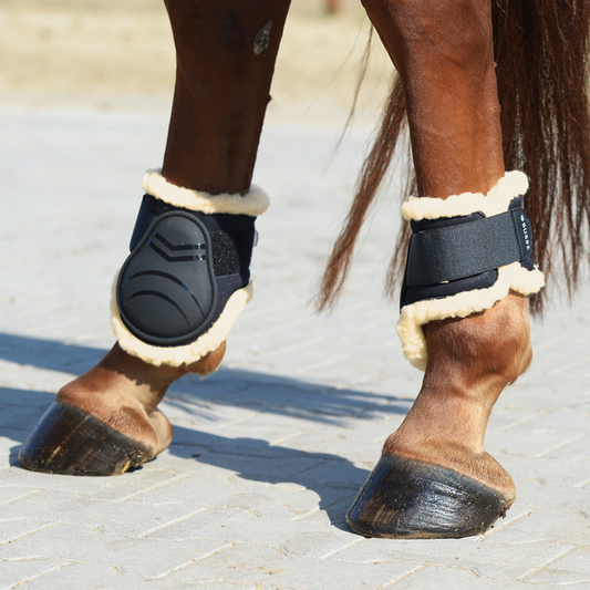 Black fetlock boots with beige fleece